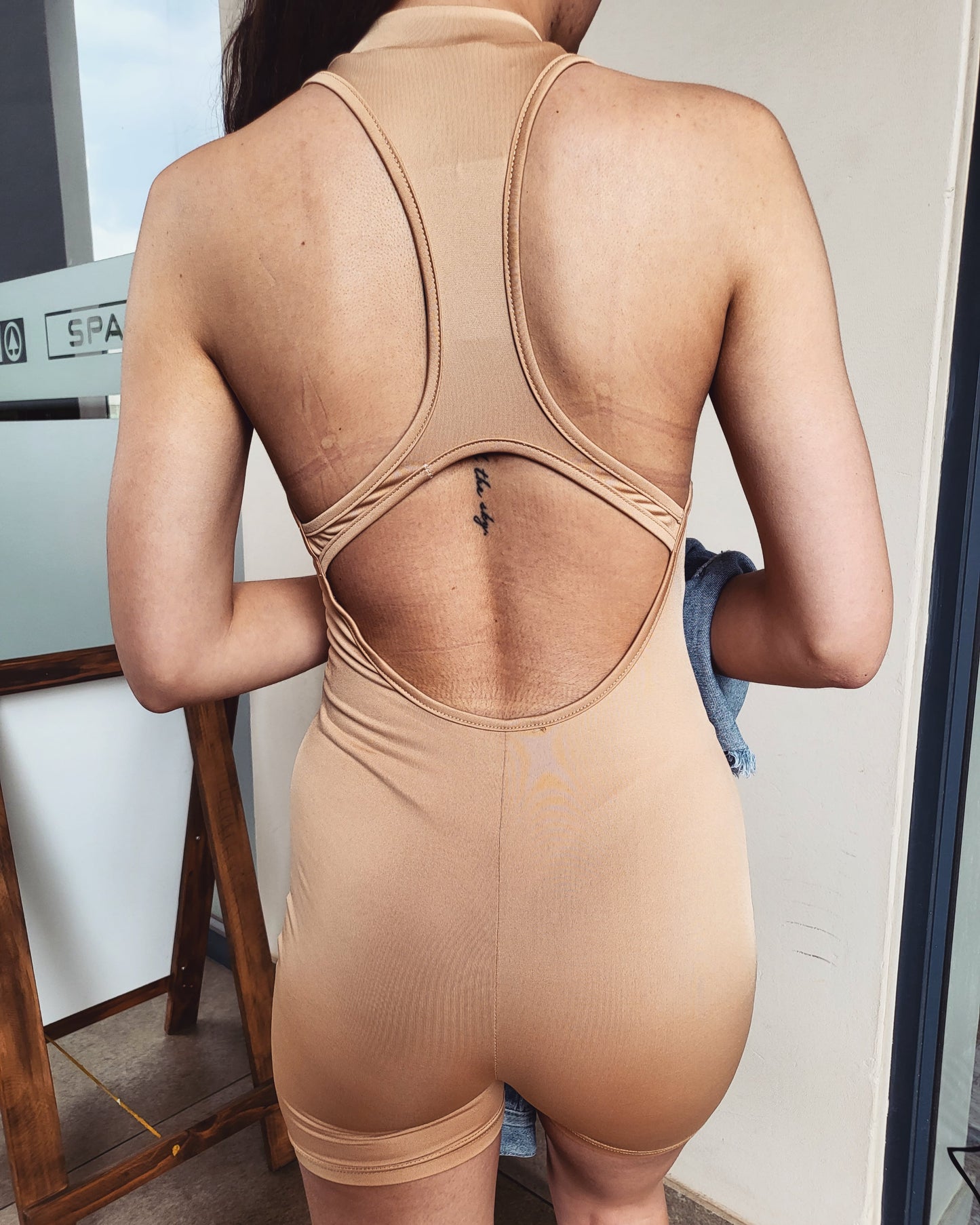 Nude cut out onesie
