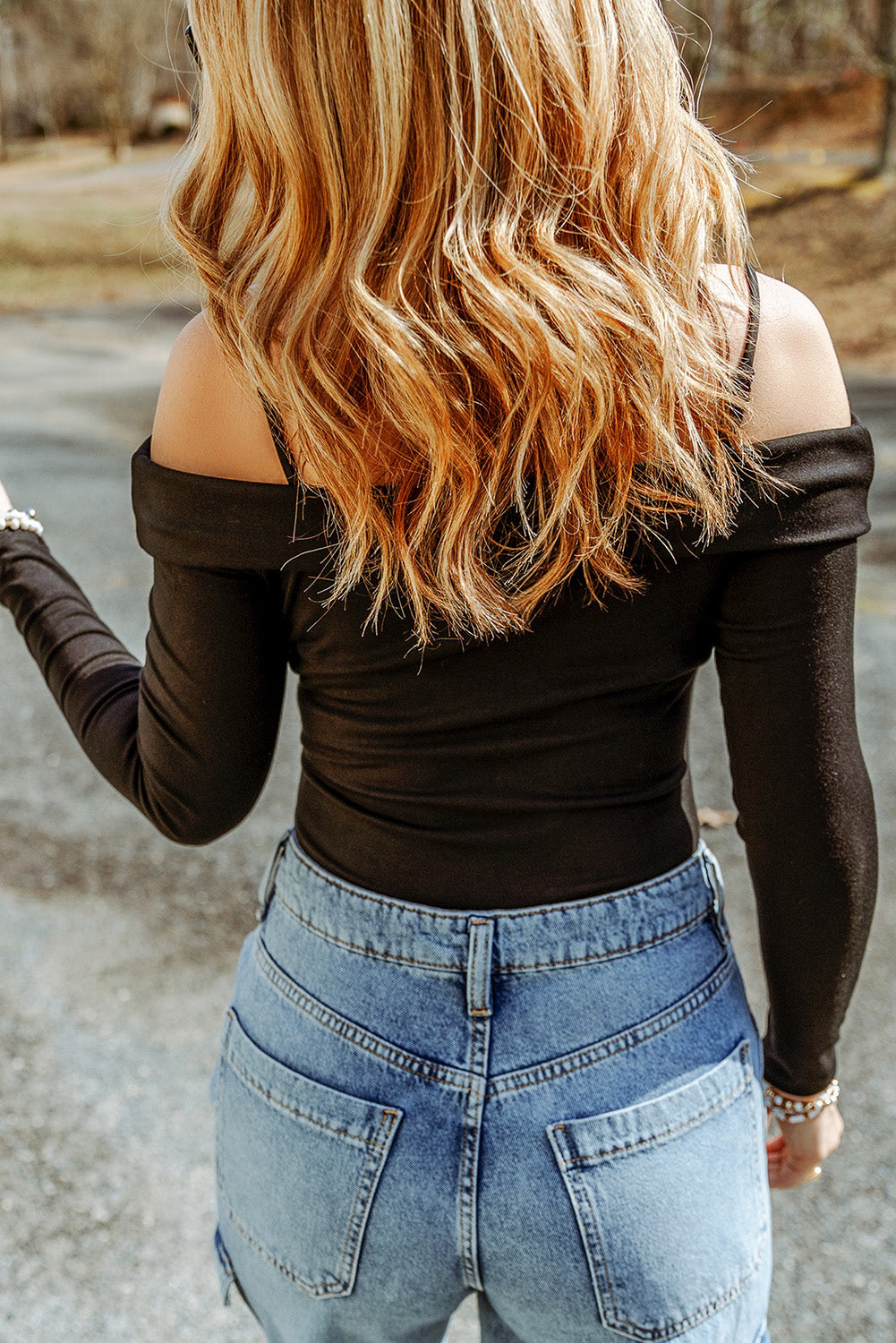 Black cold shoulder bodysuit